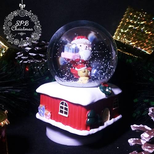 Музыкальный снежный шар «Дед Мороз с подарком» (14см, d8см, механика)